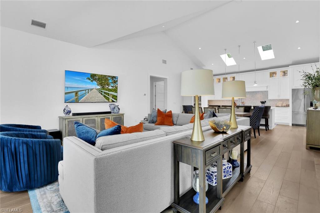 2130 Curtis Street Naples, FL 34112 - Photo 5 of 31 a living room with furniture and a wooden floor