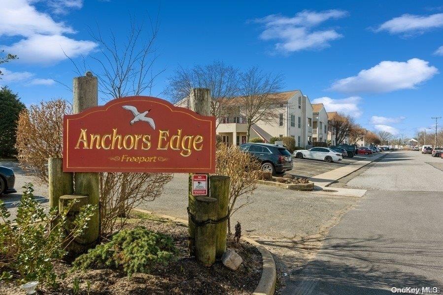39 Anchor Street, Unit J Freeport, NY 11520 - Photo 1 of 1 a view of outdoor space with sign board
