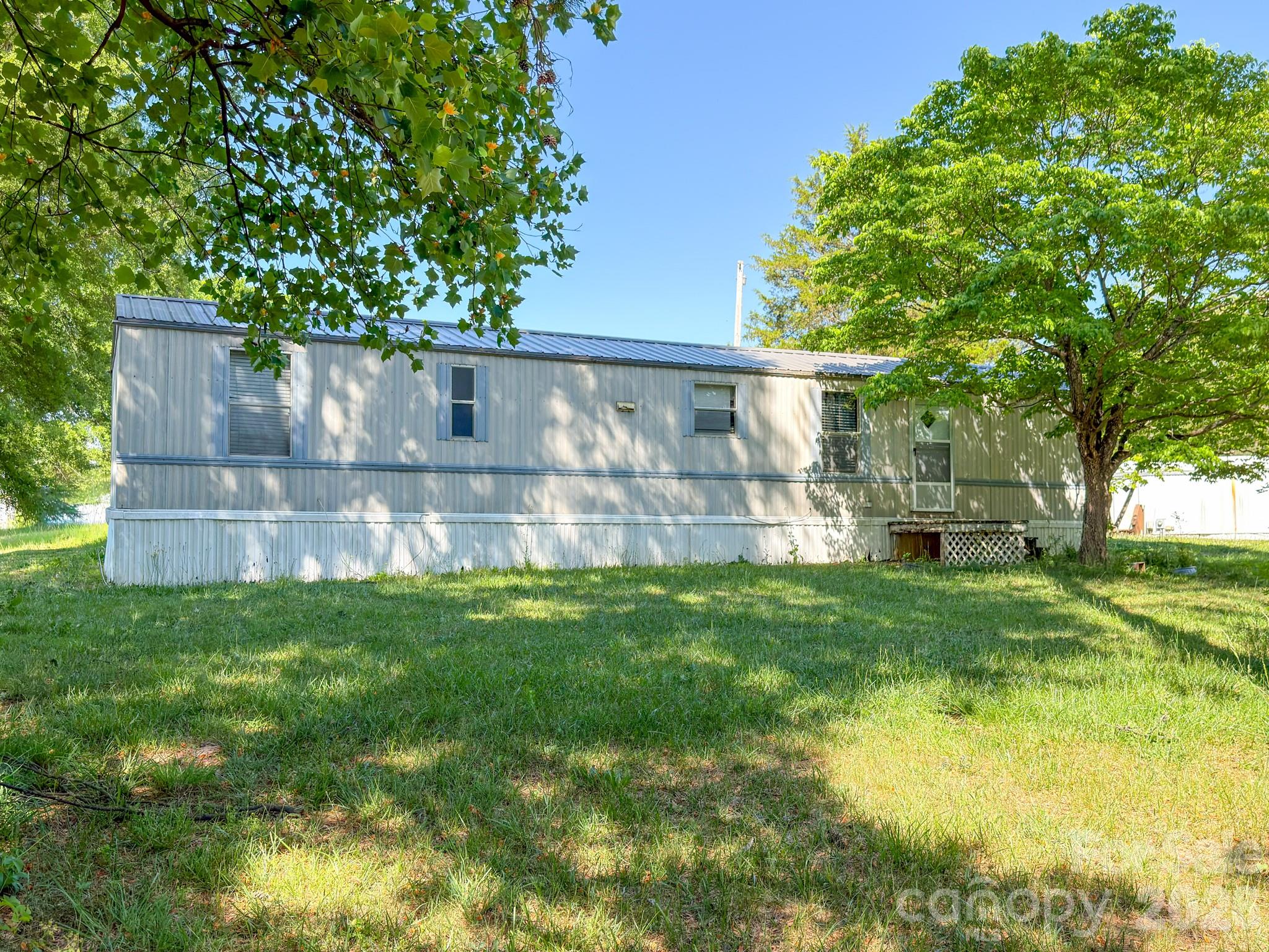 142 Delaware Road Statesville, NC 28625 - Photo 2 of 9 a view of house with backyard