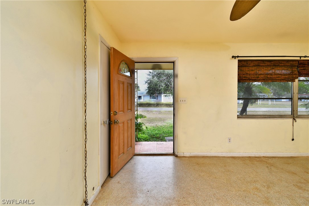 502 Wyoming Road Lehigh Acres, FL 33936 - Photo 3 of 20 a view of a porch
