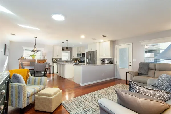 a living room with furniture and a couch