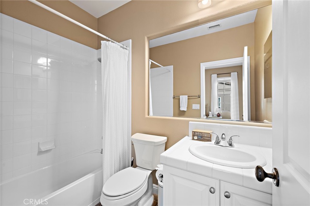 7 Julia Street Ladera Ranch, CA 92694 - Photo 33 of 52 a bathroom with a sink toilet vanity and tub