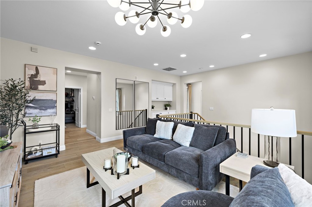 7 Julia Street Ladera Ranch, CA 92694 - Photo 36 of 52 a living room with furniture and wooden floor