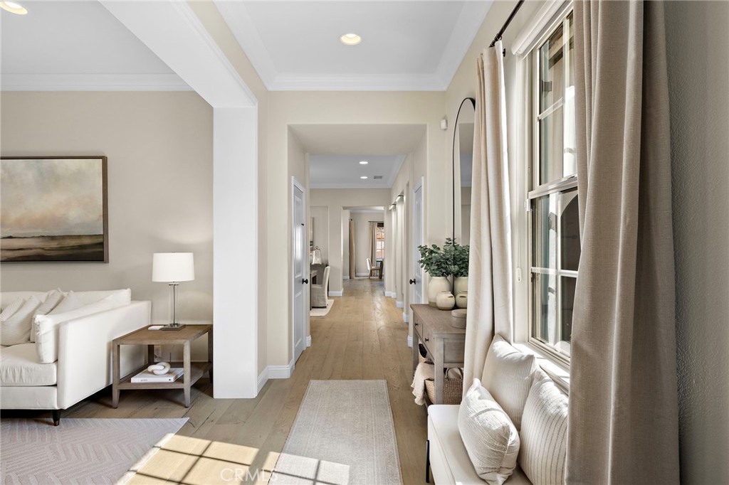 7 Julia Street Ladera Ranch, CA 92694 - Photo 6 of 52 a living room with furniture and a painting on the wall