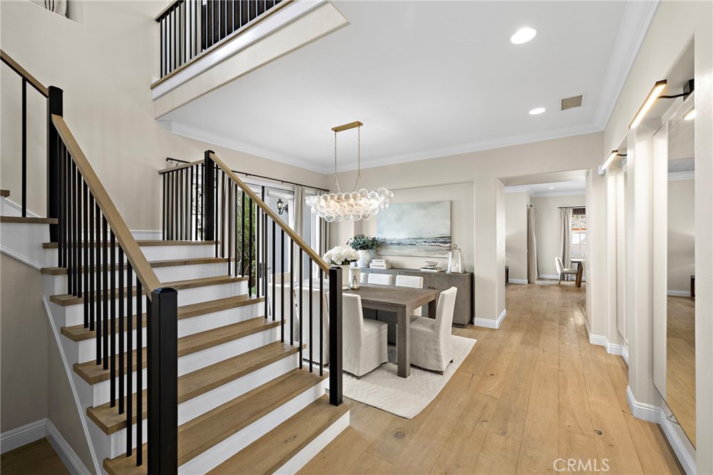 7 Julia Street Ladera Ranch, CA 92694 - Photo 7 of 52 a view of a hallway with wooden floor and staircase
