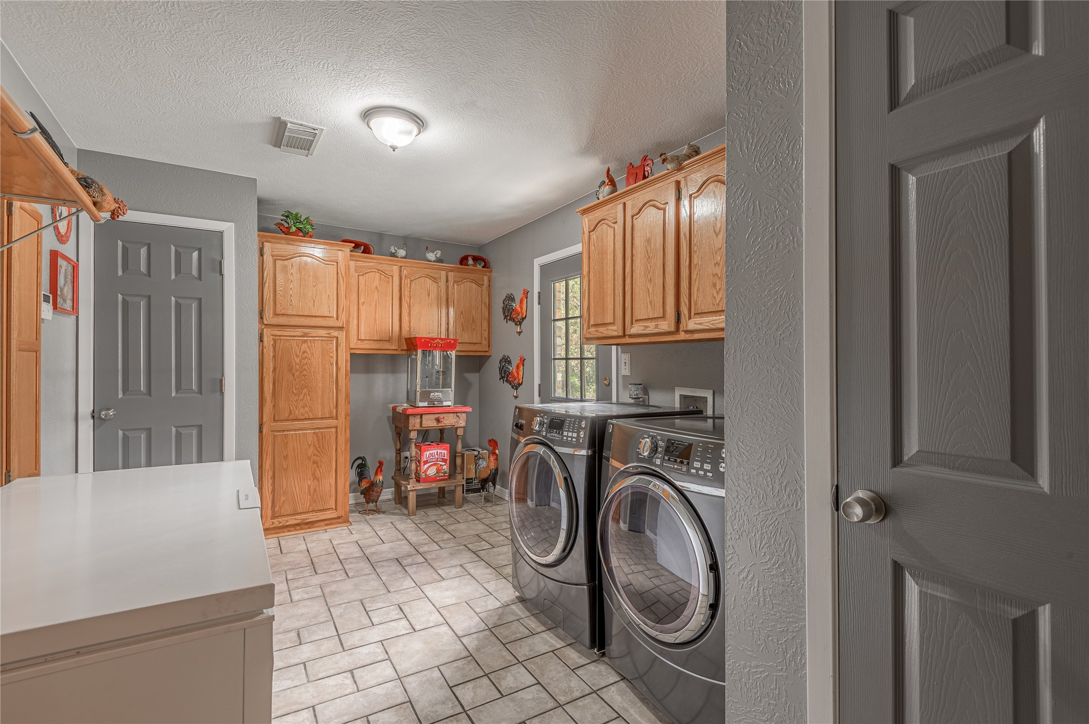 70 William Thomas Road Huntsville, TX 77320 - Photo 17 of 50 a storage room with washer and dryer
