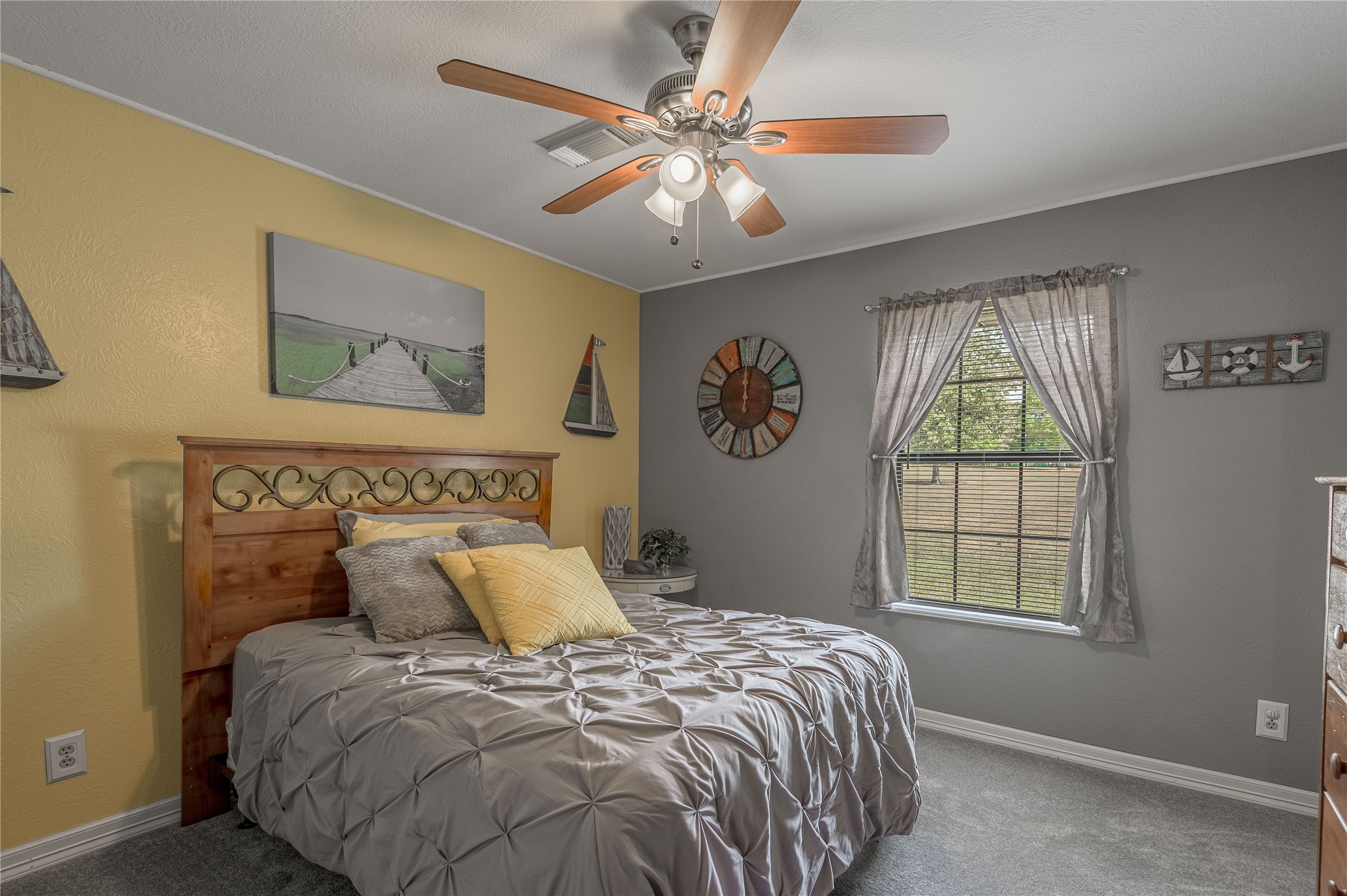 70 William Thomas Road Huntsville, TX 77320 - Photo 23 of 50 a bedroom with a bed and a window