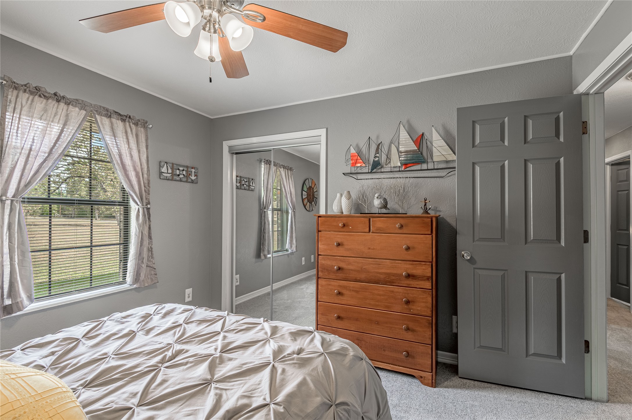 70 William Thomas Road Huntsville, TX 77320 - Photo 24 of 50 a bedroom with a bed and a window