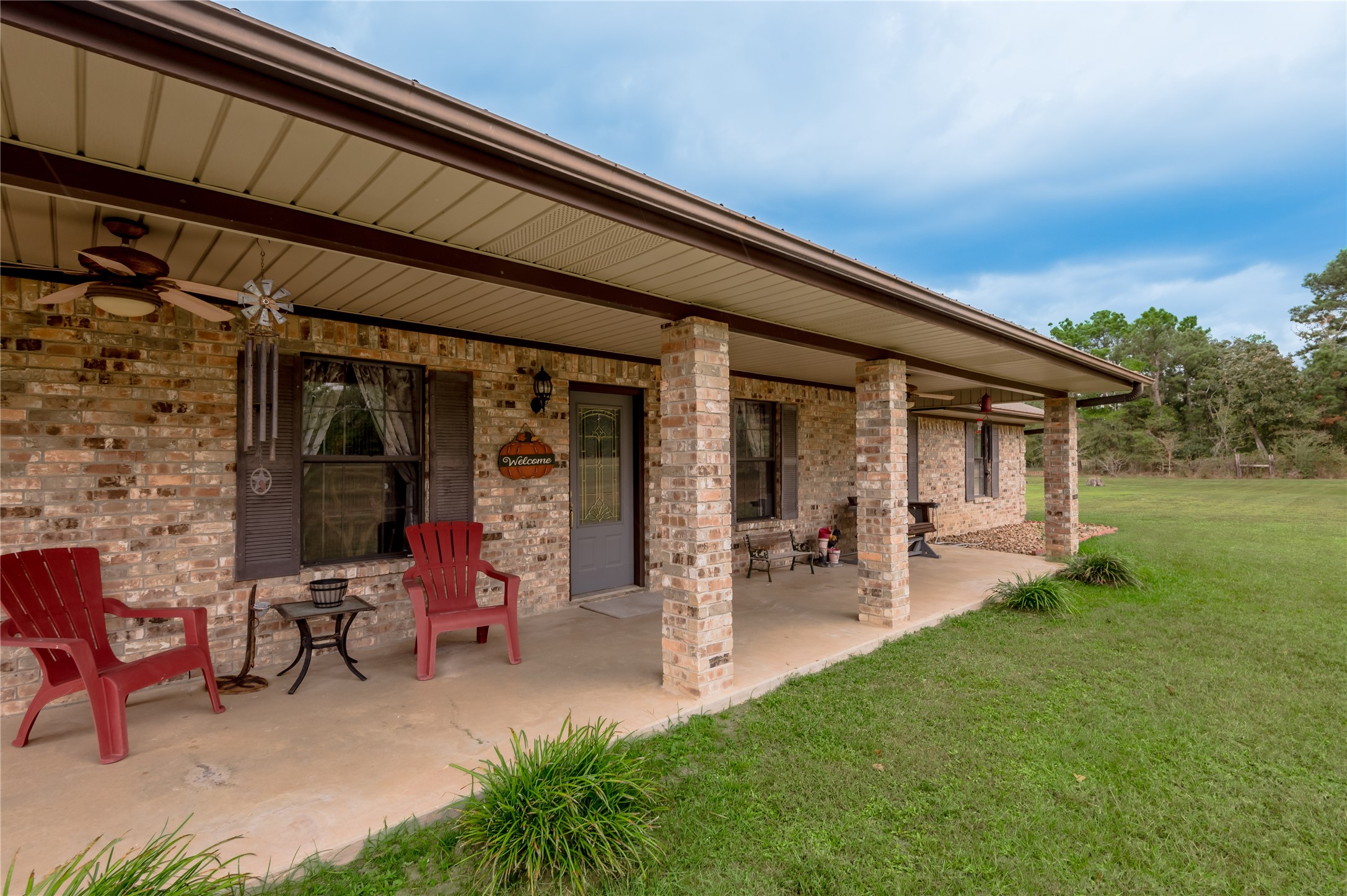 70 William Thomas Road Huntsville, TX 77320 - Photo 3 of 50 a view of a house with patio