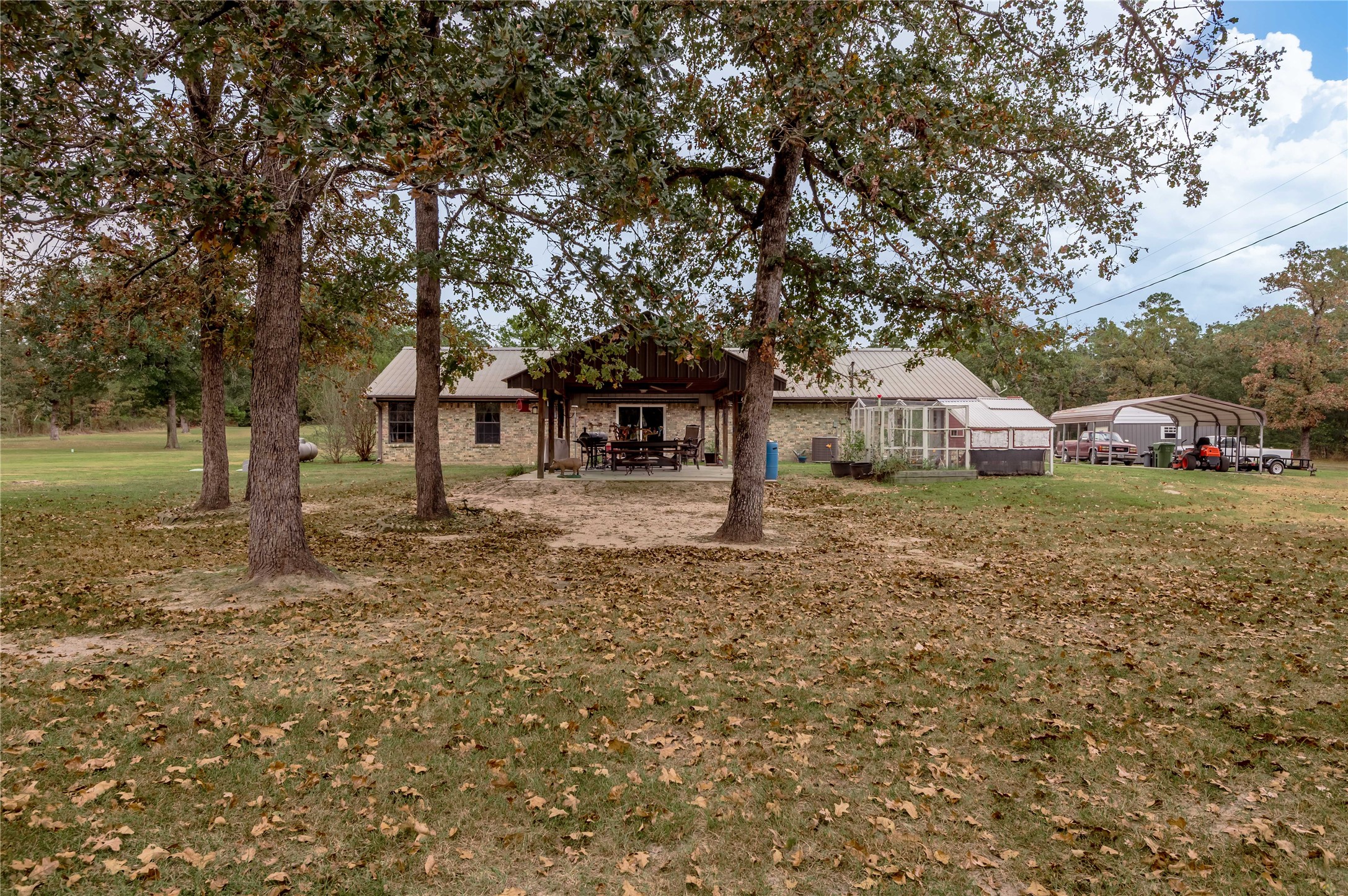 70 William Thomas Road Huntsville, TX 77320 - Photo 37 of 50 a front view of a house with garden