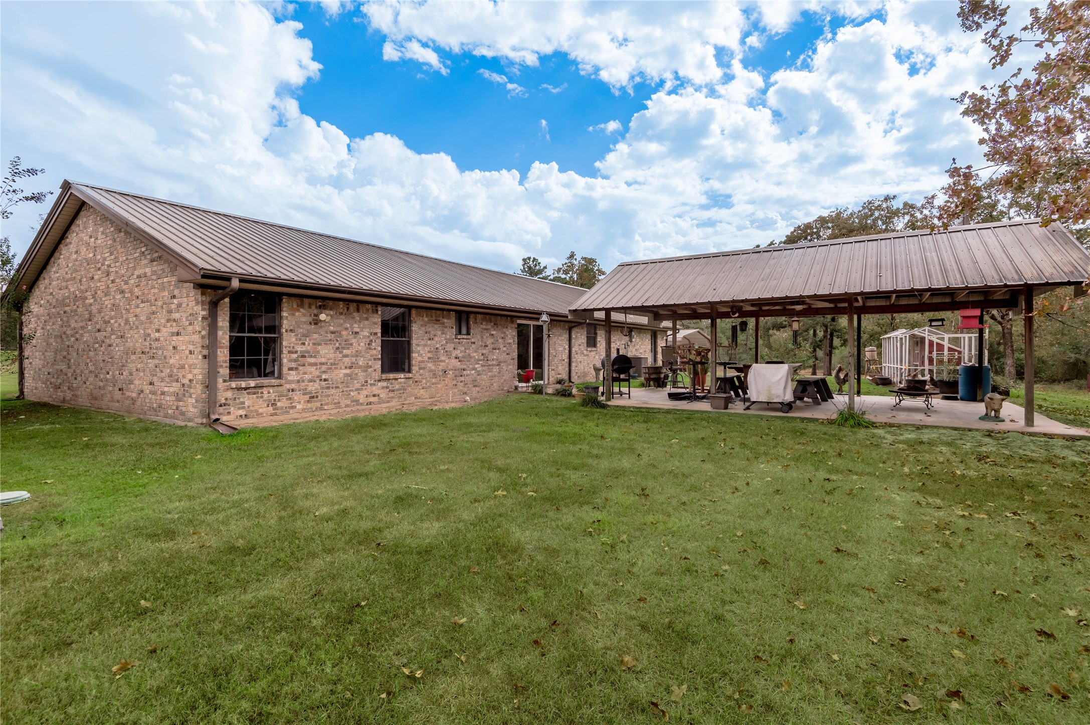 70 William Thomas Road Huntsville, TX 77320 - Photo 40 of 50 a front view of a house with garden