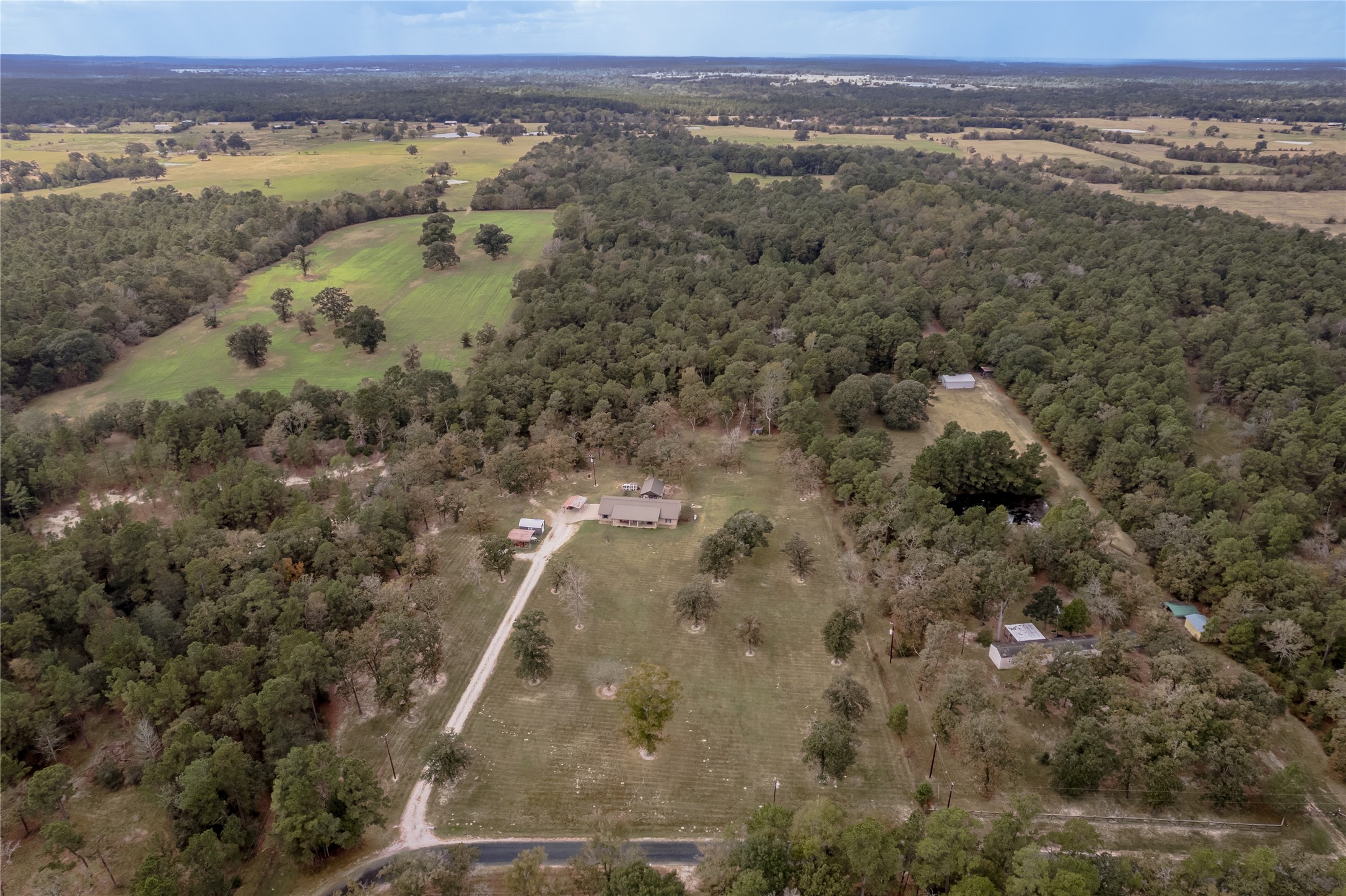 70 William Thomas Road Huntsville, TX 77320 - Photo 46 of 50 a view of an outdoor space with a lake view