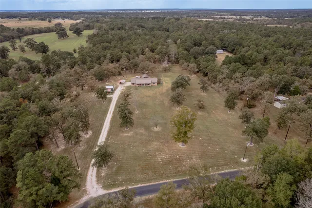 a view of a house with a big yard