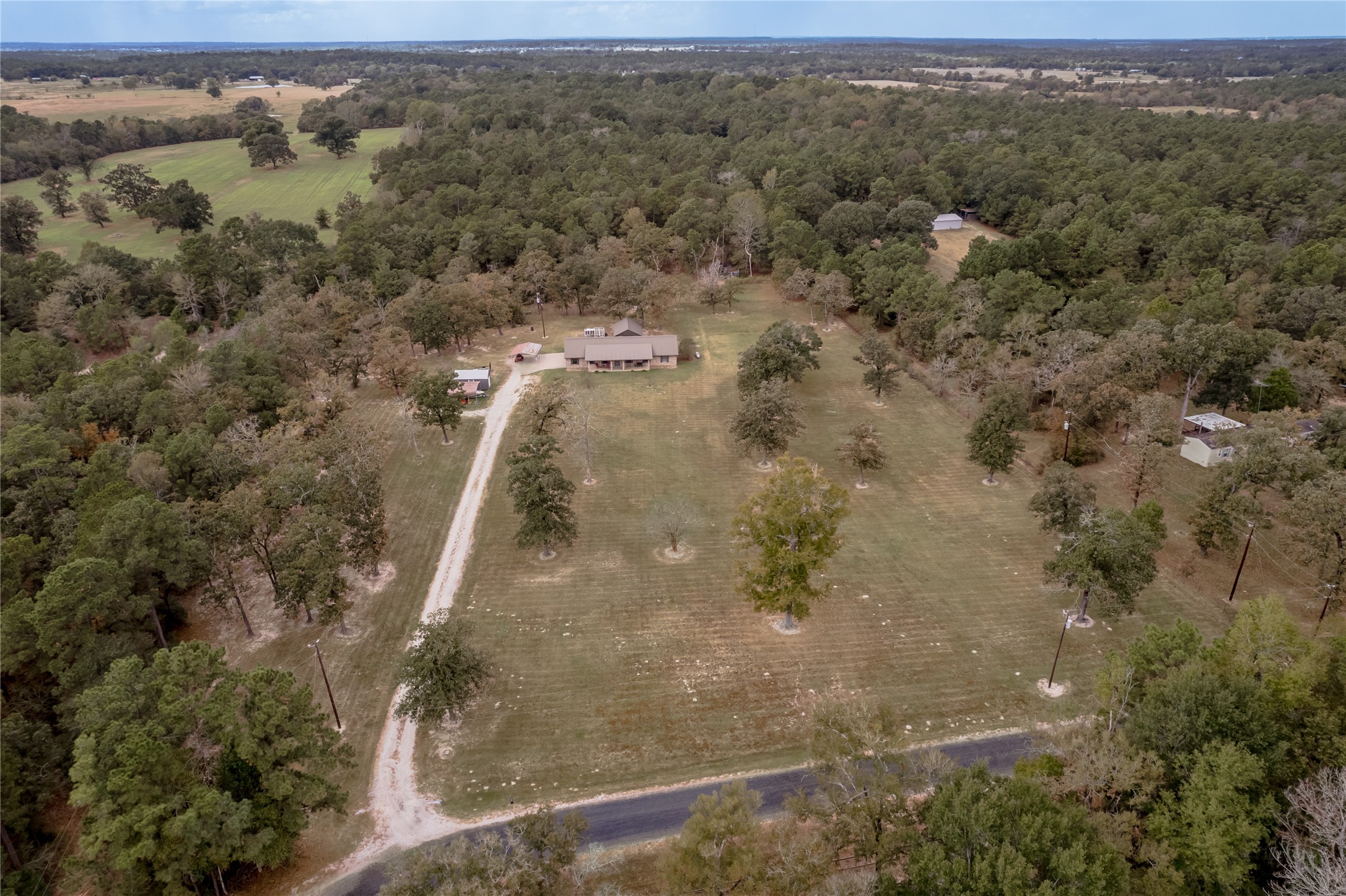 70 William Thomas Road Huntsville, TX 77320 - Photo 47 of 50 an aerial view of house with yard