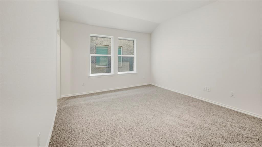 4101 Oakcrest Lane Princeton, TX 75407 - Photo 11 of 26 an empty room with a window
