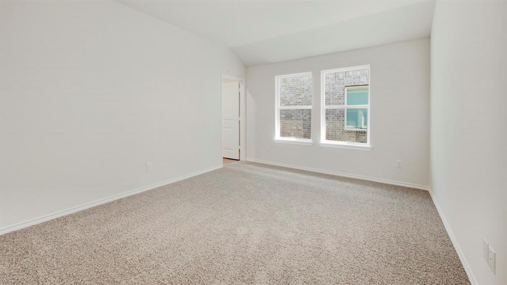 4101 Oakcrest Lane Princeton, TX 75407 - Photo 10 of 26 an empty room with a window