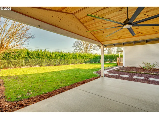 a view of a yard with an outdoor space