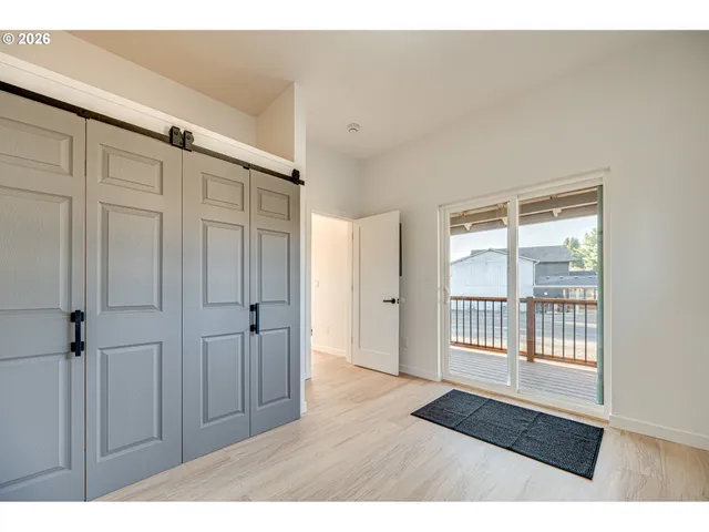 a view interior of a house with wooden floor and windows