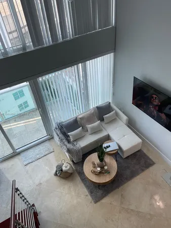 a view of a couches in a balcony