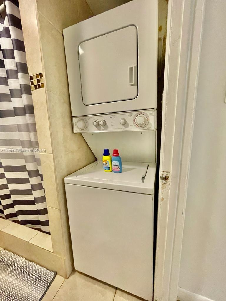 Wynwood Miami, FL 33127 - Photo 13 of 16 a utility room with dryer and washer