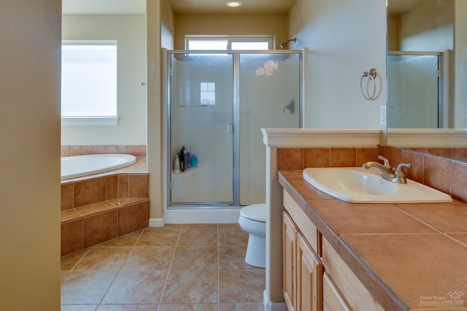 1622 Northwest Rimrock Drive Redmond, OR 97756 - Photo 13 of 22 This master bath has a wonderful soaking