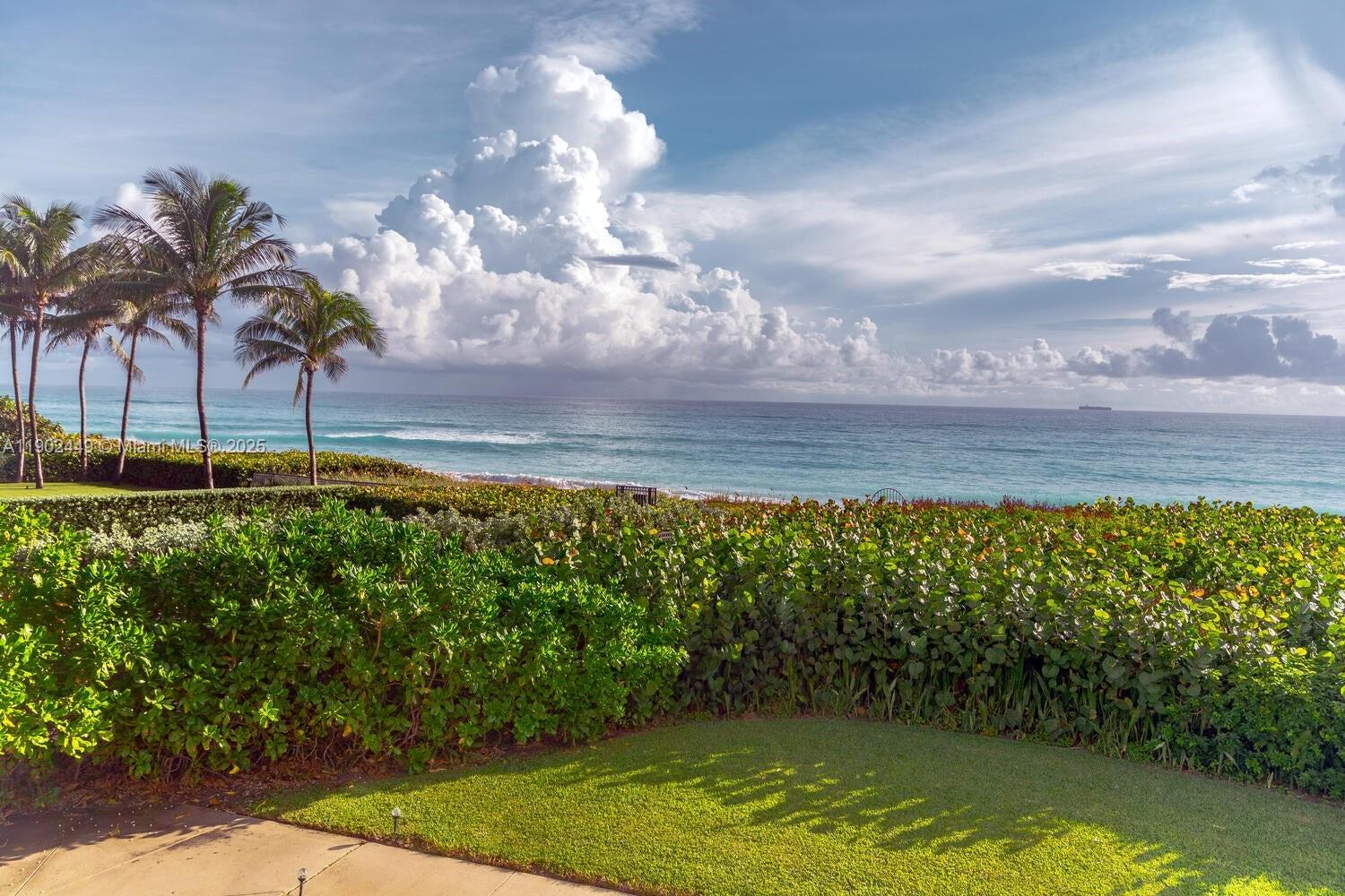 290 Celestial Way, Unit 2 Juno Beach, FL 33408 - Photo 2 of 40 a view of a lake
