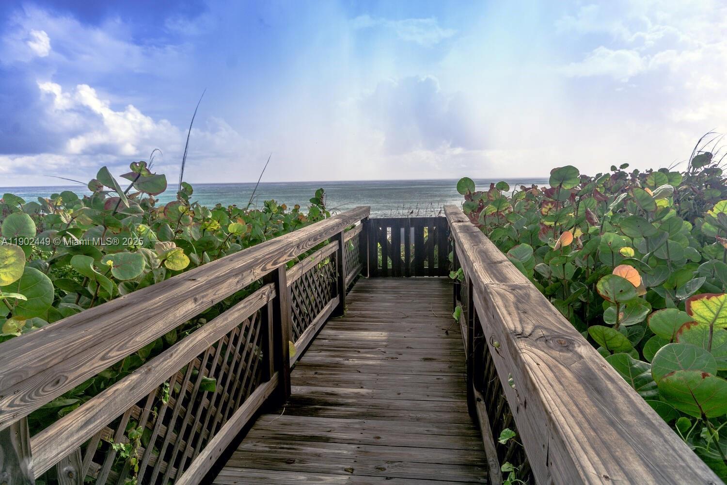 290 Celestial Way, Unit 2 Juno Beach, FL 33408 - Photo 28 of 40 a view of balcony with wooden floor