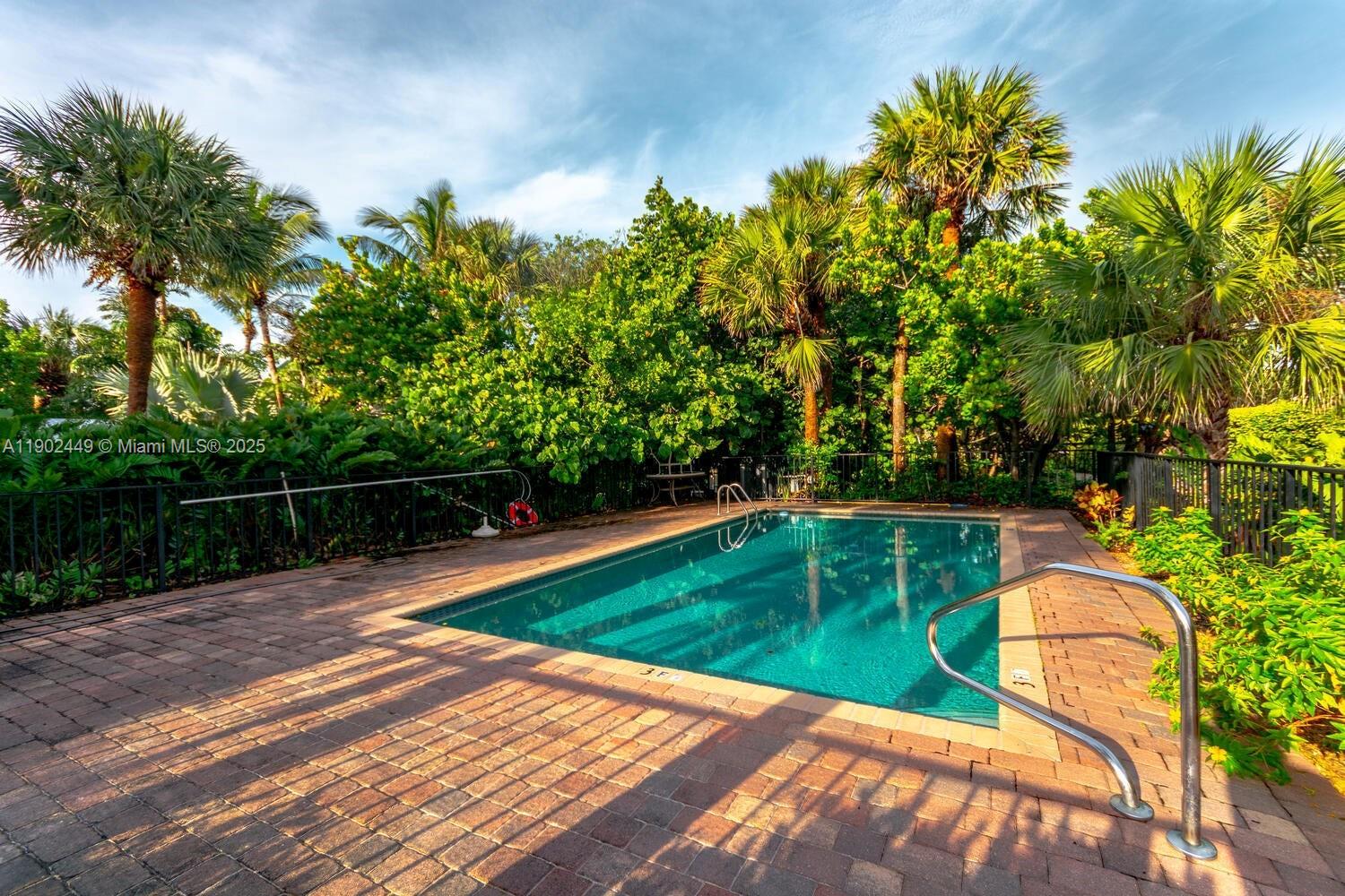 290 Celestial Way, Unit 2 Juno Beach, FL 33408 - Photo 33 of 40 a view of swimming pool