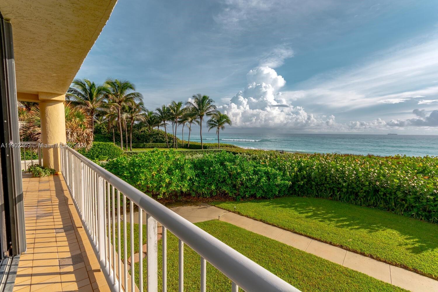 290 Celestial Way, Unit 2 Juno Beach, FL 33408 - Photo 36 of 40 a view of a pathway with a garden