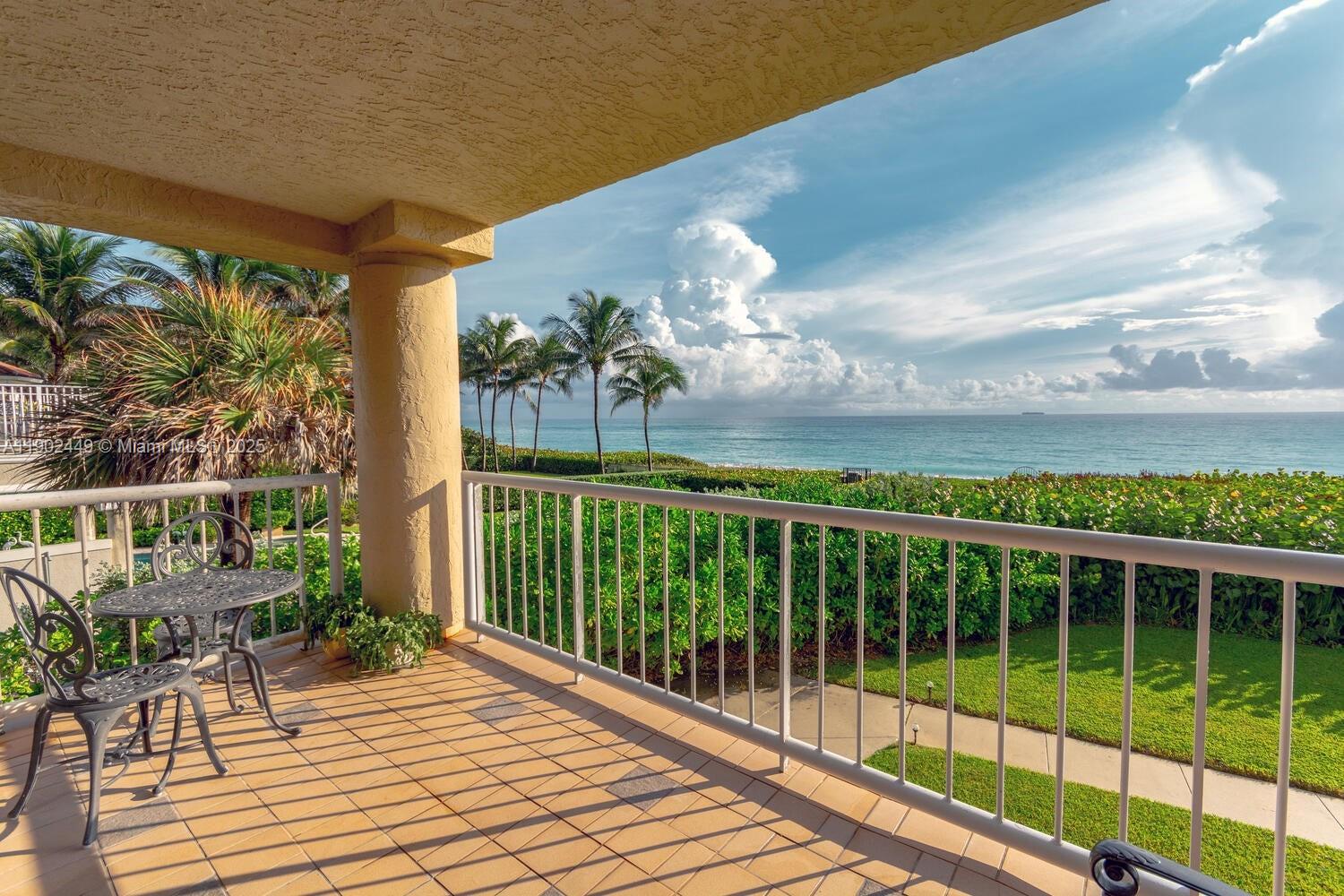290 Celestial Way, Unit 2 Juno Beach, FL 33408 - Photo 5 of 40 a view of a balcony with lake view