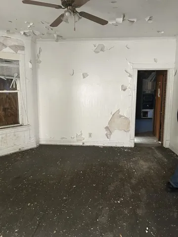 a refrigerator freezer sitting inside of a kitchen