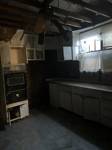 a view of empty room with windows