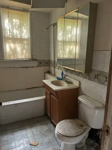 a view of cabinets and window