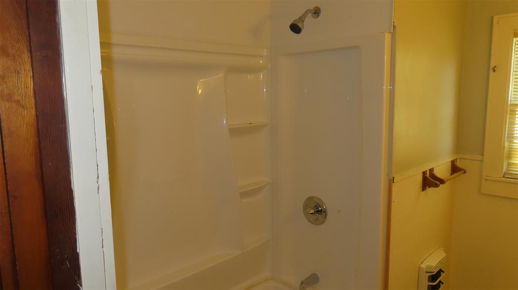 107 6th Street Northeast Springhill, LA 71075 - Photo 11 of 19 a bathroom with a shower