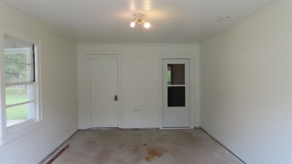 107 6th Street Northeast Springhill, LA 71075 - Photo 13 of 19 an empty room with windows