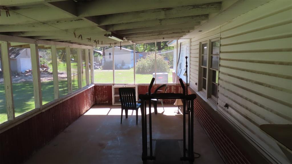 107 6th Street Northeast Springhill, LA 71075 - Photo 15 of 19 a view of a patio with a table chairs and a patio