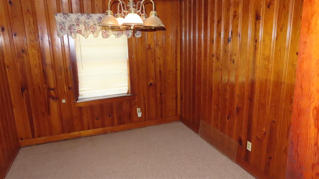 107 6th Street Northeast Springhill, LA 71075 - Photo 5 of 19 a view of a chandelier fan and windows