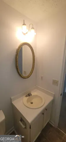 an aerial view of residential houses with swimming pool