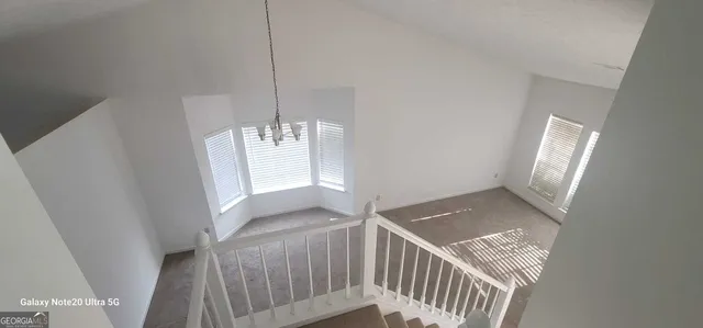 a view of an empty room and window