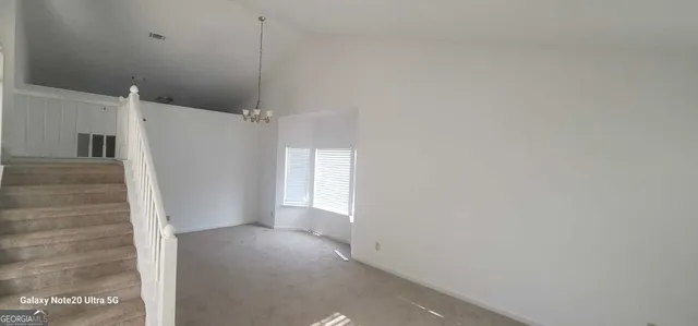 a view of a hallway with closet