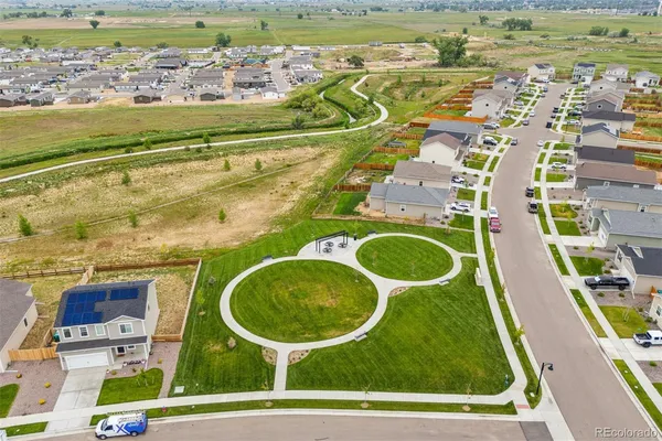 an aerial view of a house with a garden