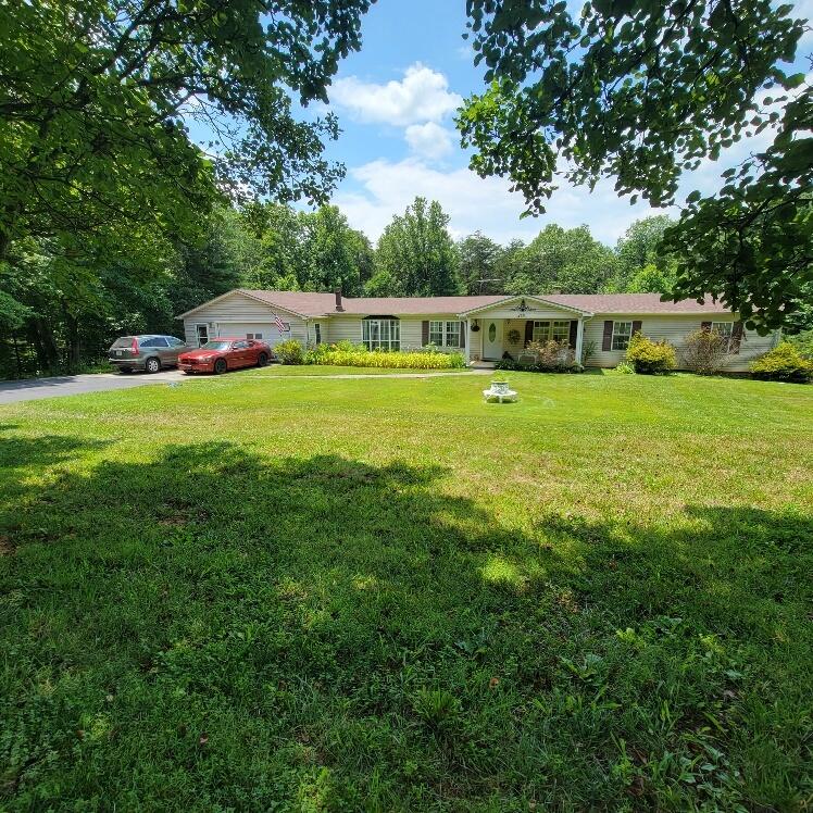 428 Green Level Road Boones Mill, VA 24065 - Photo 54 of 55 a view of a house with a backyard