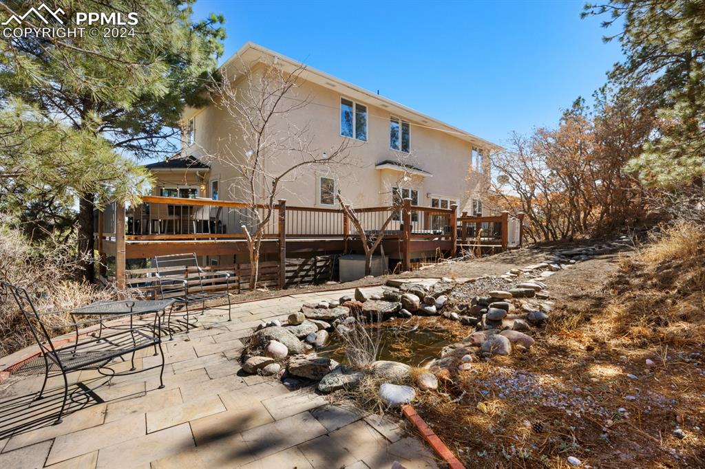 220 Preservation Way Colorado Springs, CO 80919 - Photo 35 of 39 a view of house with wooden fence