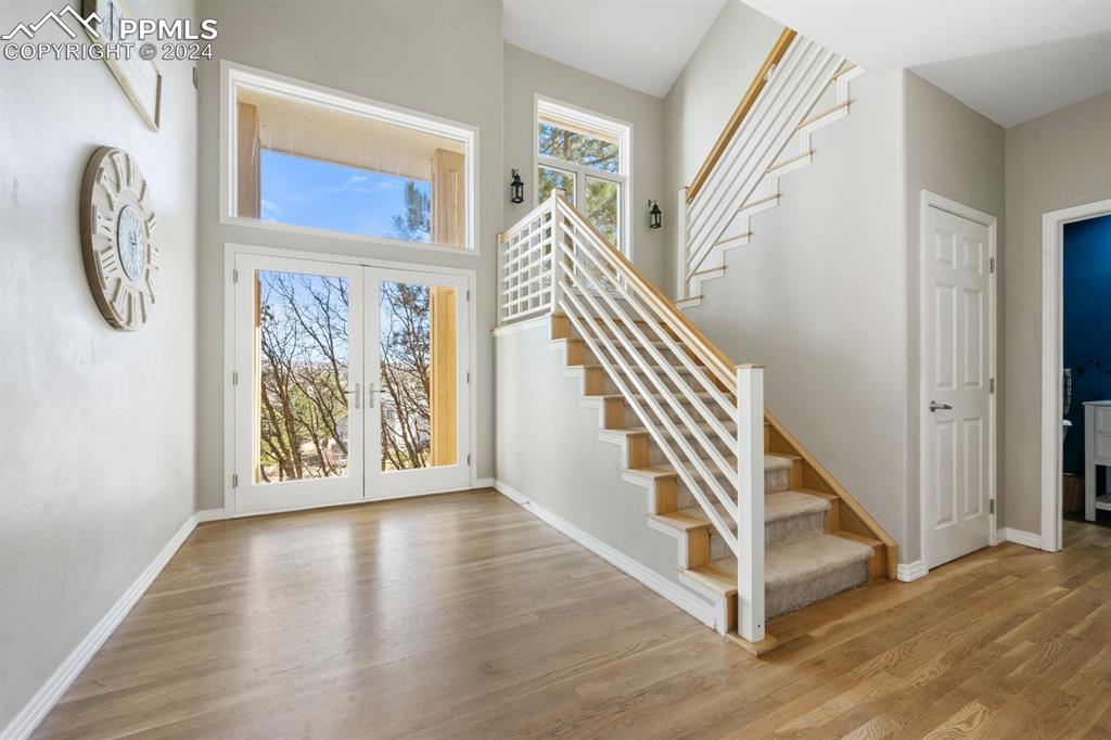 220 Preservation Way Colorado Springs, CO 80919 - Photo 8 of 39 a view of an entryway with wooden floor