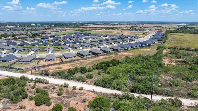 a view of a city with ocean view