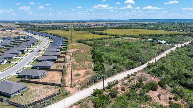 a view of a city with an ocean view