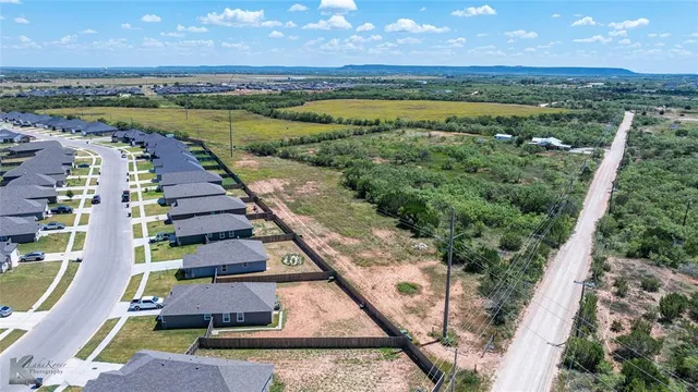 a view of a city with an ocean view