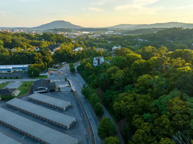 an aerial view of a house with mountain view