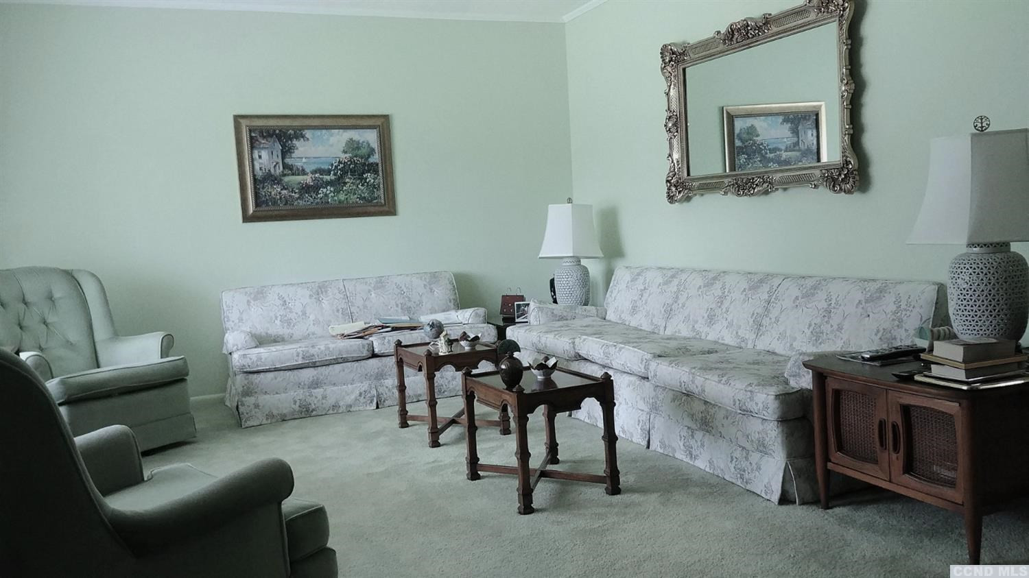 84 Latham Ridge Road Latham, NY 12110 - Photo 2 of 10 a living room with furniture and a couch