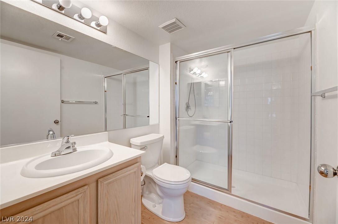 1908 Rio Canyon Court, Unit 202 Las Vegas, NV 89128 - Photo 13 of 29 PRIMARY BATH WITH WALK-IN SHOWER